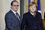 Tổng thống Pháp Francois Hollande (trái) và Thủ tướng Đức Angela Merkel tại cuộc gặp. (Nguồn: AFP/TTXVN)