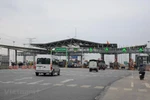 Theo lộ trình của Bộ Giao thông Vận tải, đến hết năm 2019, các trạm thu phí phải lắp đặt xong thu phí không dừng. (Ảnh: Việt Hùng/Vietnam+)