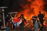 Bạo loạn tại Chile. (Nguồn: The Guardian)