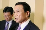 Bộ trưởng Tài chính Nhật Bản Taro Aso (phải) tại Hội nghị thường niên của IMF và WB ở Washington, DC ngày 14/4. (Nguồn: Kyodo/TTXVN) 