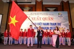 Bộ Trưởng Bộ Văn hóa-Thể thao và Du lịch Nguyễn Ngọc Thiện và các vận động viên tại lễ xuất quân dự Olympic 2016. (Ảnh: Quốc Khánh/TTXVN)