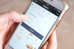 Một người đặt xe qua ứng dụng của Didi Chuxing. (Nguồn: Shutterstock)
