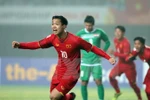 Cầu thủ Công Phượng đội U23 Việt Nam vui mừng sau khi ghi bàn thắng vào lưới đội U23 Iraq. (Ảnh: Hoàng Linh/TTXVN)