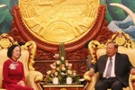Trưởng Ban Dân vận Trung ương Trương Thị Mai hội kiến Tổng Bí thư, Chủ tịch nước Lào Bounnhang Volachit. (Ảnh: Xuân Tú/TTXVN)