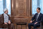 Tổng thống Syria Bashar al-Assad (phải) trong cuộc gặp phái đoàn nghị sĩ Quốc hội Iran do Chủ nhiệm Ủy ban An ninh Quốc gia và Chính sách Đối ngoại thuộc Quốc hội Mojtaba Zonnour (trái) dẫn đầu tại Damascus ngày 13/11/2019. (Ảnh: AFP/TTXVN)