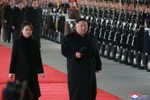 Nhà lãnh đạo Triều Tiên Kim Jong-un (phải) lên đường tới Trung Quốc ngày 8/1/2019. (Ảnh: Yonhap/TTXVN)