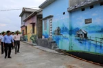 [Photo] Làng chài Ngư Mỹ Thạnh hút khách từ những bức bích họa