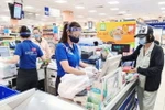 Các điểm bán thuộc Saigon Co.op đảm bảo quy định phòng, chống dịch bệnh COVID-19. (Ảnh: TTXVN phát)