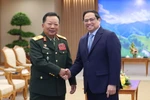 Thủ tướng Phạm Minh Chính tiếp Đại tướng Chansamone Chanyalath, Phó Thủ tướng, Bộ trưởng Bộ Quốc phòng Lào. (Ảnh: Dương Giang/TTXVN)