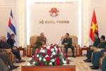Tổng Tham mưu trưởng Quân đội nhân dân Việt Nam Nguyễn Tân Cương tiếp Chủ nhiệm chính trị Các lực lượng vũ trang cách mạng Cuba Vicstor Rojo Ramos. (Ảnh: Trọng Đức/TTXVN)