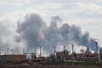 Khói bốc lên sau một cuộc không kích nhằm vào vị trí của IS tại làng Baghouz, tỉnh Deir Ezzor, miền đông Syria, ngày 2/3/2019. (Ảnh: AFP/ TTXVN)