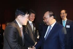 Thủ tướng Nguyễn Xuân Phúc và các đại biểu. (Ảnh: Thống Nhất/TTXVN)