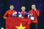 Nguyễn Việt Anh-Nguyễn Chế Thanh-Vương Hoài Ân giành HCV Aerobic. (Ảnh: Vietnam+)