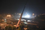 Hiện trường vụ sập cầu. (Nguồn: THX/TTXVN)