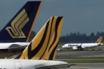 Máy bay của Singapore Airlines và Tiger Airways tại sân bay Changi, Singapore. (Nguồn: Reuters)