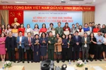 Các tập thể, cá nhân nhận giải thưởng Phát triển Văn hóa đọc năm 2022 chụp ảnh chung cùng các đại biểu. (Ảnh: Thanh Tùng/TTXVN)