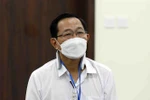 Bị cáo Cao Minh Quang (sinh năm 1956, cựu Thứ trưởng Bộ Y tế) tại phiên xét xử sơ thẩm. (Ảnh: Phạm Kiên/TTXVN)
