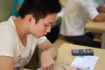 Thí sinh dự thi trung học phổ thông quốc gia. (Ảnh: TTXVN)