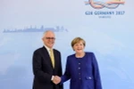 Thủ tướng Australia Malcolm Turnbull đã gặp Thủ tướng Đức Angela Merkel. (Ảnh: EPA/TTXVN)