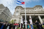 Lễ thượng cờ Cuba tại Đại sứ quán Cuba ở thủ đô Washington (Mỹ) ngày 20/7. (Ảnh: AFP/ TTXVN)