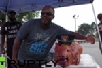 Hình ảnh "con lợn cảnh sát" được sử dụng để chế giễu cảnh sát Darren Wilson. (Nguồn: rt)