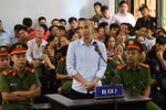 Bị cáo Đinh Công Tráng tại phiên tòa xét xử sơ thẩm. (Ảnh: Đinh Tuấn/TTXVN)
