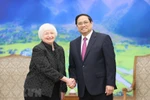 Thủ tướng Phạm Minh Chính và Bộ trưởng Tài chính Hoa Kỳ Janet Yellen. (Ảnh: Dương Giang/TTXVN) 