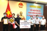 Lễ trao số tiền hỗ trợ 1 tỷ đồng của Công ty Gulf Việt Nam dành cho tỉnh Bến Tre. (Ảnh: TTXVN phát)
