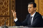 Tổng thống Syria Bashar al-Assad phát biểu trong một cuộc họp tại Damascus. (Ảnh: AFP/TTXVN)