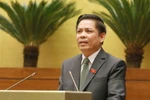 Bộ trưởng Bộ Giao thông Vận tải Nguyễn Văn Thể giải trình, tiếp thu ý kiến của đại biểu Quốc hội. (Ảnh: Phương Hoa/TTXVN)
