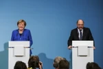 Thủ tướng Đức đồng thời là lãnh đạo Dân chủ/Xã hội Cơ đốc giáo (CDU/CSU) Angela Merkel và Lãnh đạo SPD Martin Schulz trong cuộc họp báo tại Berlin ngày 12/1. (Nguồn: THX/TTXVN)
