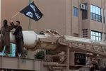 Các tay súng IS tại thành phố Raqa, Syria, ngày 30/6/2014. (Nguồn: AFP/TTXVN) 