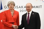 Thủ tướng Theresa May và Tổng thống Nga Vladimir Putin. (Nguồn: BBC) 