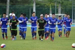 Các tuyển thủ chạy thả lỏng sau buổi tập buổi tập. (Ảnh: Quốc Khánh/TTXVN)
