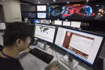 Nhân viên Cơ quan An ninh và Internet Hàn Quốc điều tra và ngăn chặn các vụ tấn công mạng ở Seoul ngày 15/5. (Nguồn: AFP/TTXVN)
