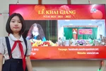 Em Trần Minh Bảo Ngọc, học sinh lớp 5A2 Trường Tiểu học Nguyễn Viết Xuân, thành phố Vũng Tàu, tỉnh Bà Rịa-Vũng Tàu dự lễ khai giảng qua truyền hình. (Ảnh: CTV)