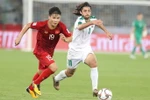 Tiền vệ Quang Hải đi bóng trong trận đấu với đội tuyển Iraq. (Ảnh: Hoàng Linh/TTXVN)
