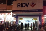 Chi nhánh ngân hàng BIDV bị cướp. (Ảnh Hồ Cầu/TTXVN)