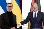 Tổng thống Phần Lan Alexander Stubb (trái) và Thủ tướng Đức Olaf Scholz. (Nguồn; AFP/TTXVN)