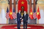 Chủ tịch nước Trần Đại Quang và Tổng thống Hoa Kỳ Barack Obama. (Ảnh: Nhan Sáng/TTXVN)