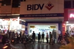 Chi nhánh ngân hàng BIDV bị cướp. (Ảnh Hồ Cầu/TTXVN)