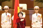 Bà Nguyễn Thị Kim Ngân tuyên thệ nhậm chức Chủ tịch Quốc hội khóa XIV. (Ảnh: Nhan Sáng/TTXVN)