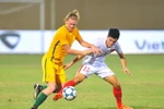 U19 Việt Nam (áo trắng) bại trận trước U19 Australia. (Nguồn: Minh Đức/TTXVN)