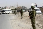 Quân cảnh Nga tuần tra gần khu vực Đông Douma. (Nguồn: AFP/TTXVN)