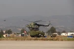Máy bay trực thăng quân sự của Nga tại căn cứ Hmeimim ở tỉnh Latakia, Tây Bắc Syria. (Nguồn: AFP/TTXVN)