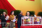  Tổng Bí thư, Chủ tịch nước Nguyễn Phú Trọng, Thủ tướng Nguyễn Xuân Phúc, Chủ tịch Quốc hội Nguyễn Thị Kim Ngân, Thường trực Ban Bí thư Trần Quốc Vượng bỏ phiếu bầu Ban Chấp hành Trung ương khóa XIII. (Ảnh: TTXVN)