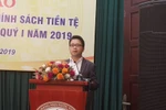 Ông Nghiêm Thanh Sơn, Phó vụ trưởng Vụ Thanh toán phát biểu tại họp báo. (Ảnh: TH/Vietnam+)