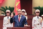 Chủ tịch nước Nguyễn Xuân Phúc tuyên thệ nhậm chức trước Quốc hội, đồng bào và cử tri cả nước. (Ảnh: Thống Nhất/TTXVN)