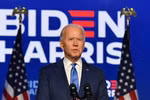 Ứng viên Tổng thống Mỹ của đảng Dân chủ Joe Biden (phải) phát biểu sau Ngày Bầu cử tại Wilmington, Delaware, ngày 6/11. (Ảnh: AFP/TTXVN)