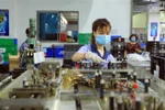 Sản xuất linh kiện điện tử. (Nguồn: TTXVN)